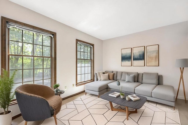 living room featuring baseboards