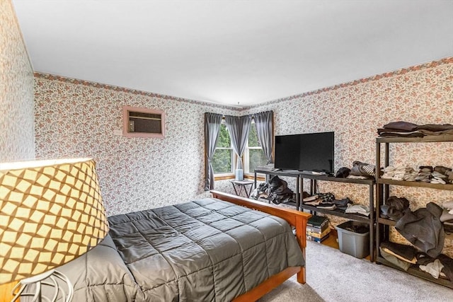 bedroom featuring wallpapered walls, carpet floors, and a wall unit AC
