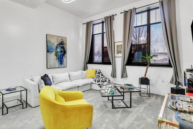 living room featuring light carpet