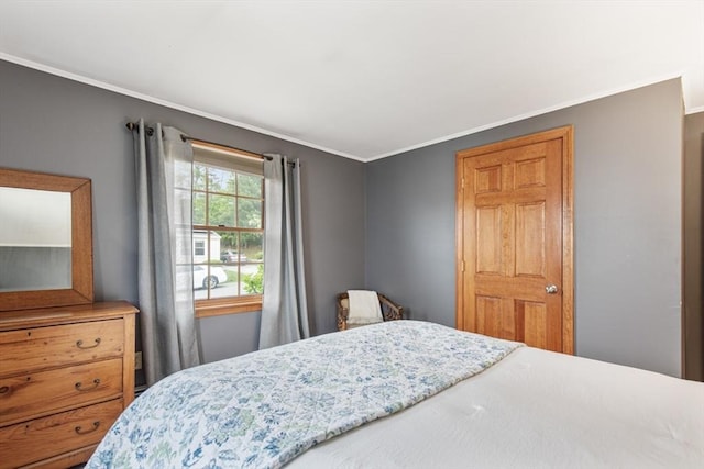 bedroom featuring crown molding