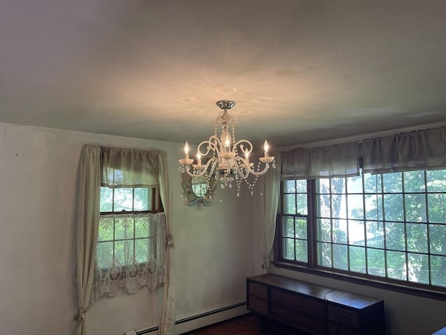 53 Beechwood St, Cohasset, MA 02025 - unfurnished dining area with a chandelier