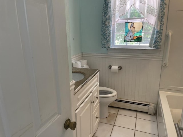 53 Beechwood St, Cohasset, MA 02025 - bathroom featuring baseboard heating, toilet, wainscoting, a tub to relax in, and vanity