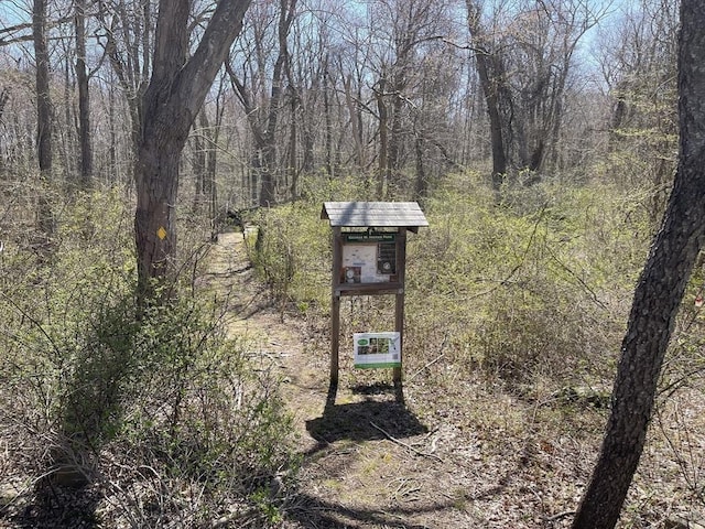 53 Beechwood St, Cohasset, MA 02025 - view of outbuilding with a wooded view