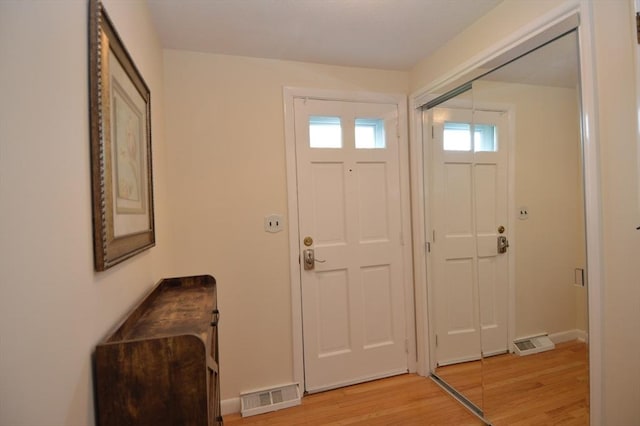 17 Bayberry Cir Unit 17, Millis, MA 02054 - foyer entrance with light wood finished floors and baseboards