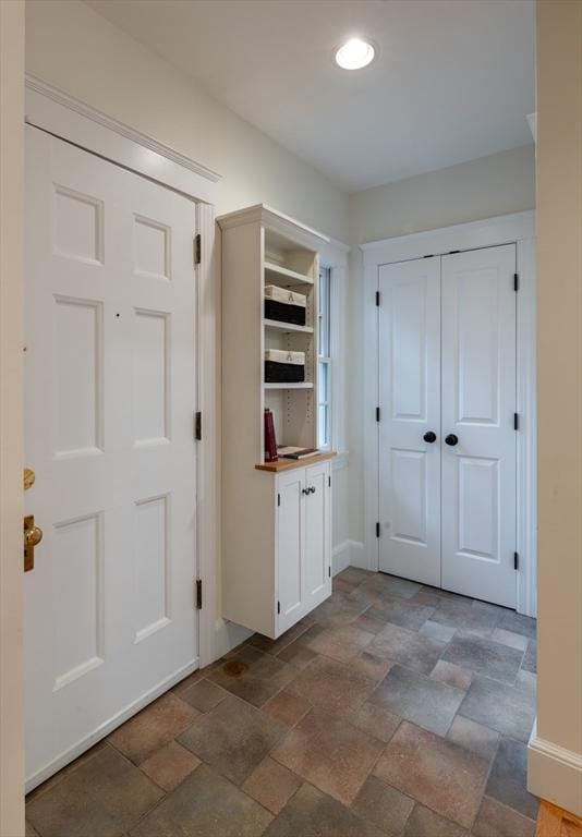 88 Round Hill Rd Unit 4, Northampton, MA 01060 - mudroom with dark stone finish floors and recessed lighting