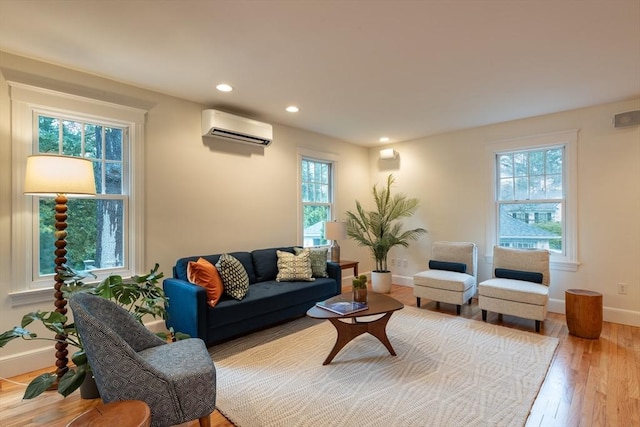 88 Round Hill Rd Unit 4, Northampton, MA 01060 - living area featuring a wall mounted AC, baseboards, plenty of natural light, and recessed lighting