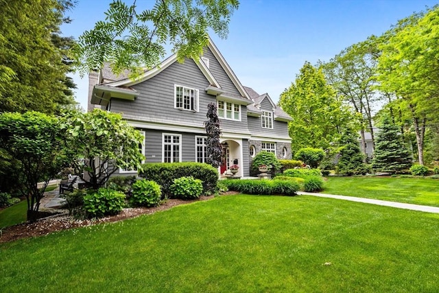 236 Grove St, Wellesley, MA 02482 - shingle-style home with a front lawn
