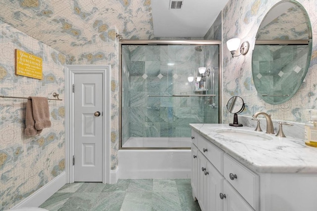 236 Grove St, Wellesley, MA 02482 - bathroom featuring vanity, bath / shower combo with glass door, and wallpapered walls