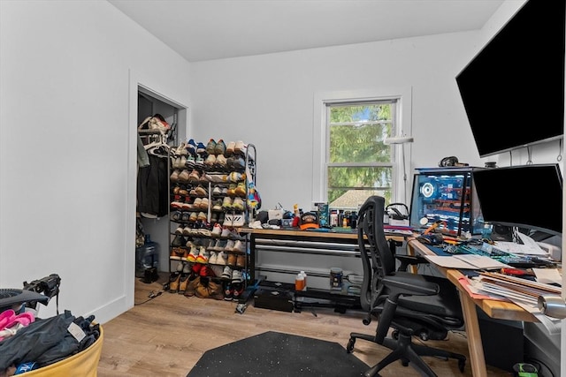 office area with wood finished floors