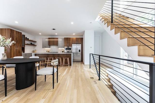95 Griswold St Unit 95, Cambridge, MA 02139 - dining space featuring light wood-style flooring and recessed lighting
