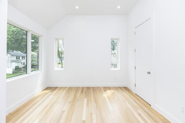 95 Griswold St Unit 95, Cambridge, MA 02139 - unfurnished room with light wood finished floors, baseboards, vaulted ceiling, and recessed lighting