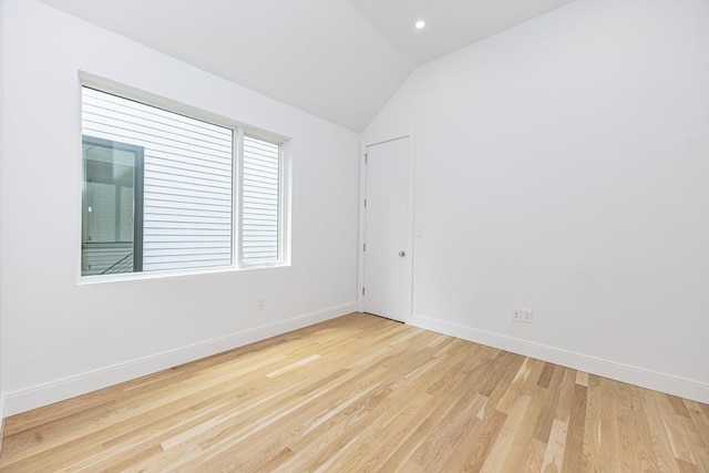 95 Griswold St Unit 95, Cambridge, MA 02139 - empty room featuring vaulted ceiling, wood finished floors, and baseboards