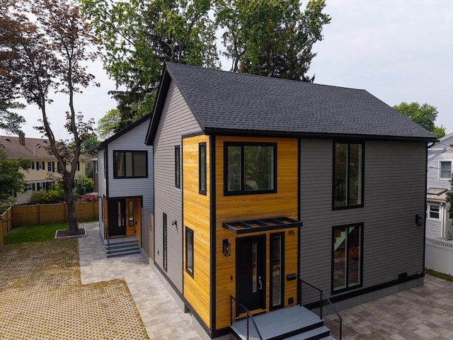 95 Griswold St Unit 95, Cambridge, MA 02139 - rear view of house featuring a patio and a shingled roof