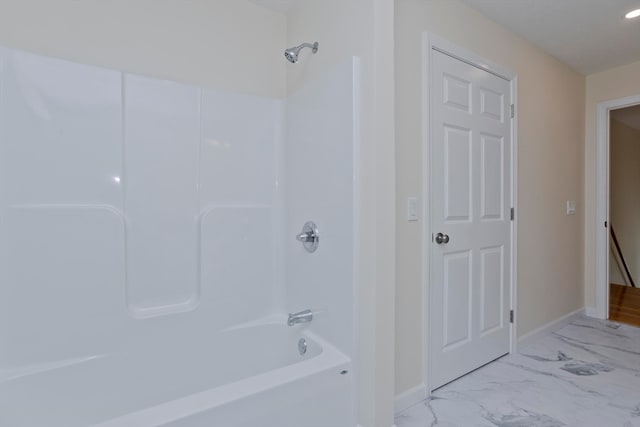 bathroom with bathing tub / shower combination