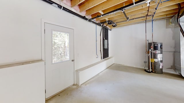 basement featuring hybrid water heater