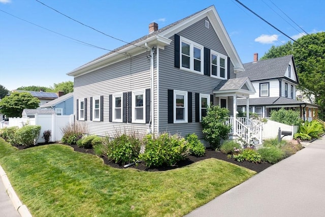 10 Saunders Rd, Lynn, MA 01904 - view of front facade with a chimney