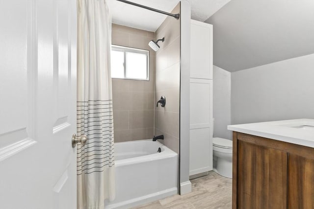 10 Saunders Rd, Lynn, MA 01904 - full bath with shower / tub combo with curtain, vanity, wood finished floors, and lofted ceiling