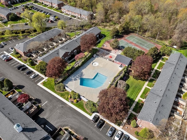 aerial view of property's location featuring a pool