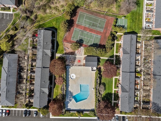 aerial view of residential area featuring a pool