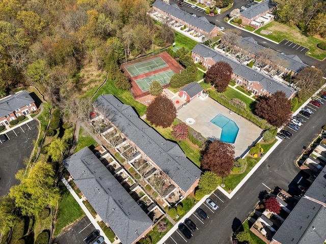 view of property location featuring a pool area