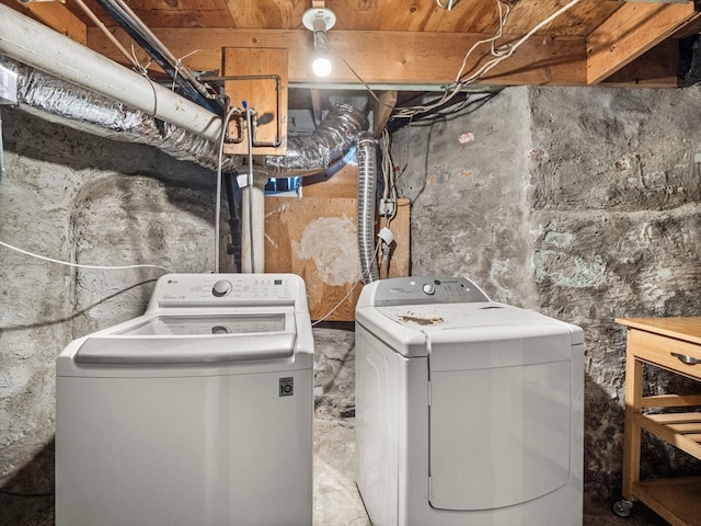 washroom with independent washer and dryer