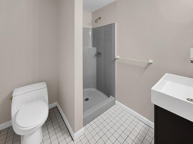 full bath featuring baseboards, a shower, toilet, tile patterned floors, and vanity