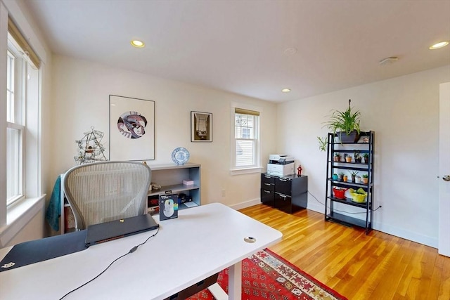 office featuring recessed lighting, baseboards, and light wood-style flooring