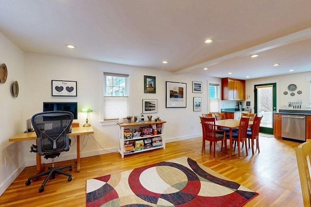 dining area with recessed lighting, baseboards, and light wood-style floors