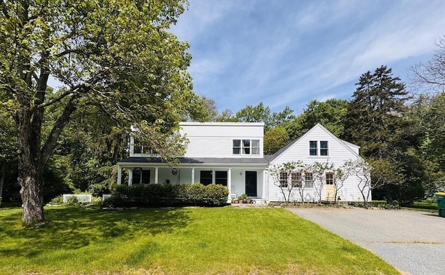 84 Walden Ter, Concord, MA 01742 - traditional-style home with a front yard and driveway