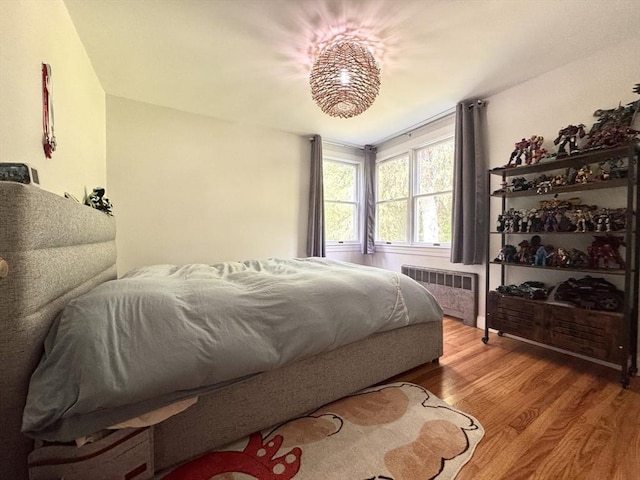 84 Walden Ter, Concord, MA 01742 - bedroom with radiator and wood finished floors
