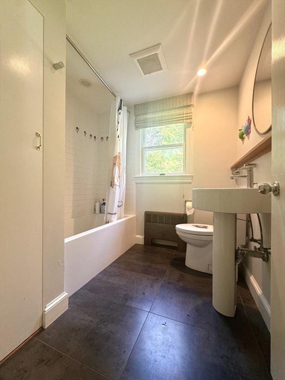 84 Walden Ter, Concord, MA 01742 - full bathroom with toilet, shower / bath combo, and baseboards