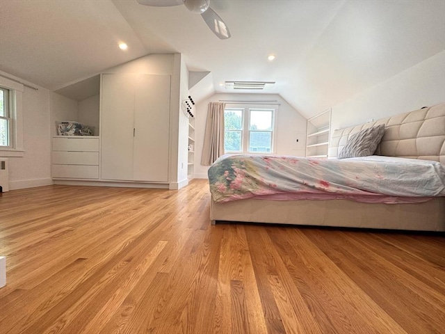84 Walden Ter, Concord, MA 01742 - bedroom featuring vaulted ceiling, light wood-type flooring, radiator, ceiling fan, and baseboards