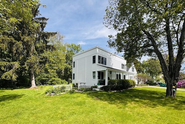 84 Walden Ter, Concord, MA 01742 - view of home's exterior with a yard