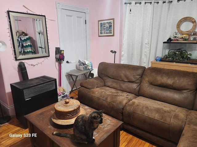 living room with wood finished floors