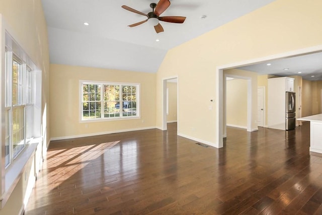 390 Marshall St, Leicester, MA 01524 - unfurnished living room featuring vaulted ceiling, ceiling fan, and dark wood-type flooring