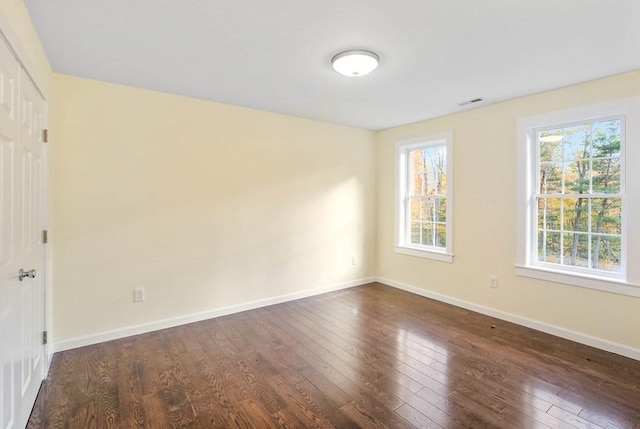 390 Marshall St, Leicester, MA 01524 - empty room featuring plenty of natural light and dark wood-type flooring