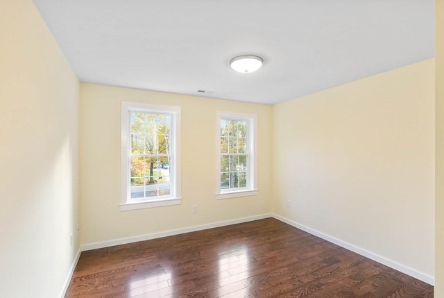 390 Marshall St, Leicester, MA 01524 - empty room featuring plenty of natural light and dark wood-type flooring