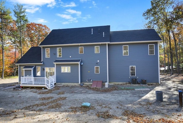 390 Marshall St, Leicester, MA 01524 - rear view of house featuring cooling unit and a wooden deck