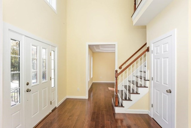 390 Marshall St, Leicester, MA 01524 - entryway featuring dark hardwood / wood-style floors, a healthy amount of sunlight, and a high ceiling