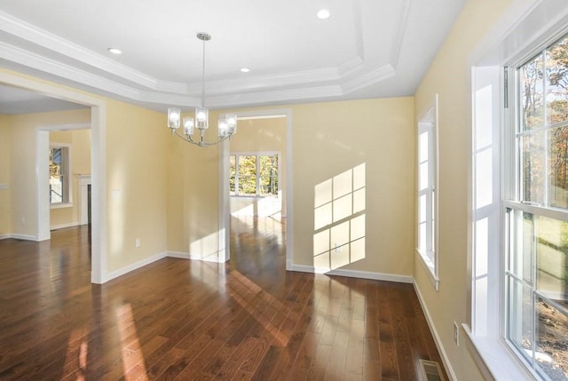 390 Marshall St, Leicester, MA 01524 - unfurnished dining area featuring a chandelier, a raised ceiling, and a healthy amount of sunlight
