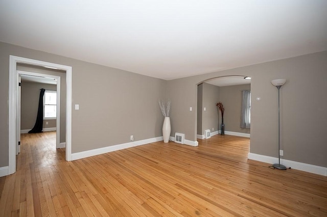 unfurnished room featuring light hardwood / wood-style floors