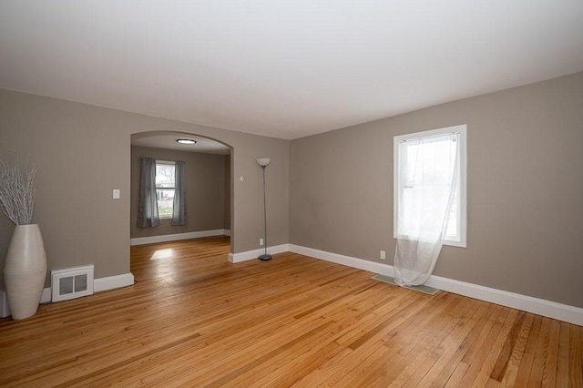 unfurnished room featuring light hardwood / wood-style floors