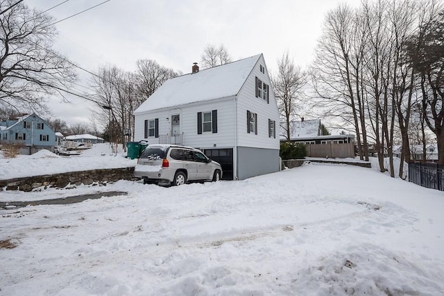 view of snow covered property