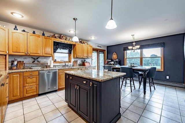 140 Sheffield Dr, Belchertown, MA 01007 - kitchen with dishwasher, a sink, light tile patterned floors, a chandelier, and pendant lighting