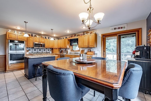 140 Sheffield Dr, Belchertown, MA 01007 - dining room with a chandelier, light tile patterned floors, and recessed lighting