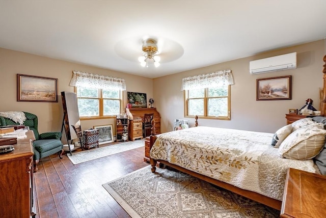 140 Sheffield Dr, Belchertown, MA 01007 - bedroom with a wall mounted air conditioner, multiple windows, hardwood / wood-style floors, and a ceiling fan