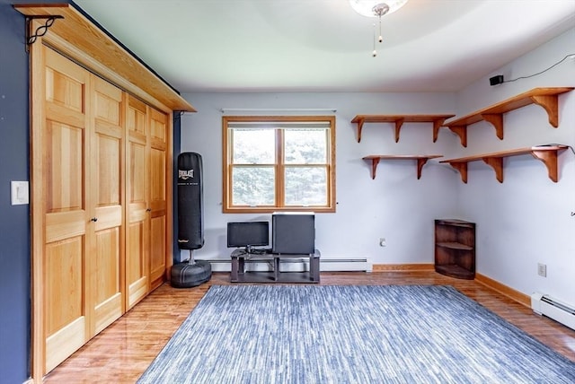 140 Sheffield Dr, Belchertown, MA 01007 - interior space with baseboard heating and light wood-type flooring