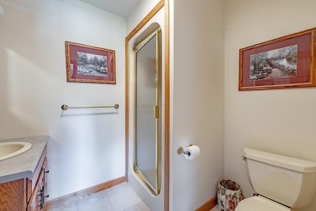 140 Sheffield Dr, Belchertown, MA 01007 - full bathroom featuring baseboards, vanity, a stall shower, toilet, and tile patterned floors