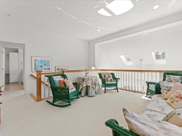 interior space featuring recessed lighting, a skylight, and carpet