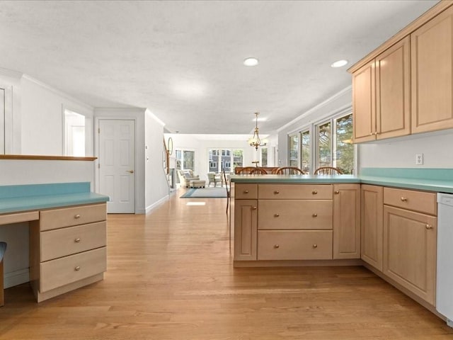 kitchen featuring light wood-style floors, open floor plan, light brown cabinetry, and crown molding